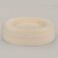 Load image into Gallery viewer, The Cocoon in cream bouclé from a high angle, showing the raised bolster walls