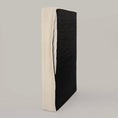 Load image into Gallery viewer, The Lounger on its side with the bouclé cover partly unzipped to show the inner liner
